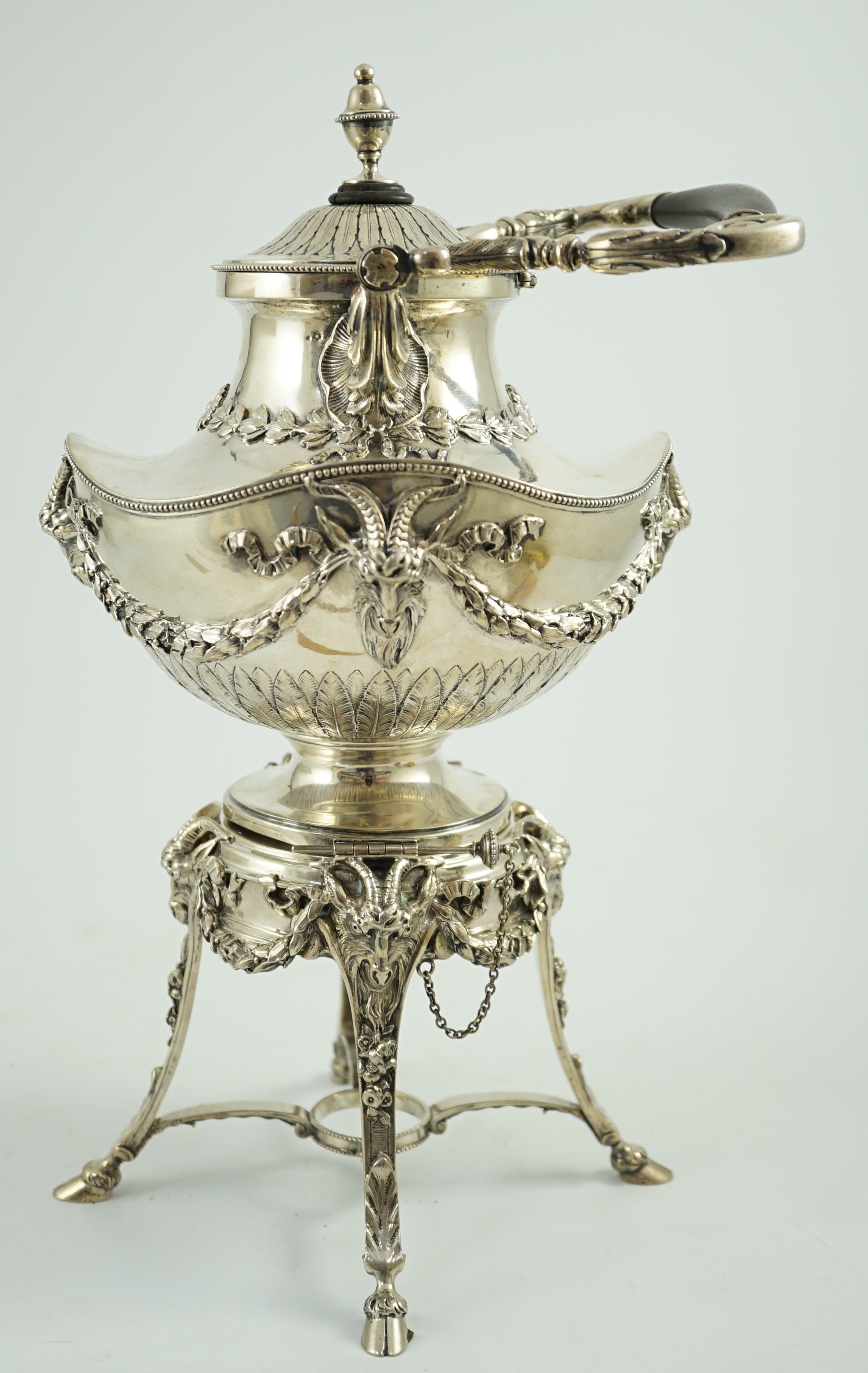 An ornate late 19th/early 20th century Austro-Hungarian 800 standard silver tea kettle on stand